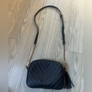 Chic Black Chevron Crossbody Bag with Gold Accents